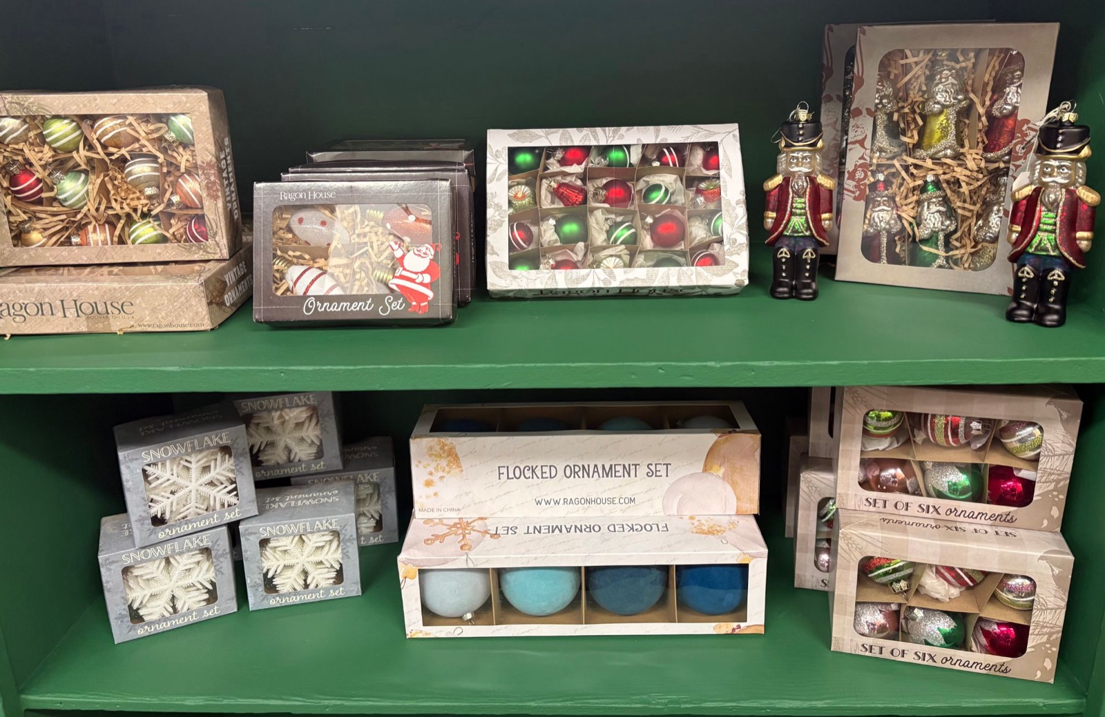 Shelves of boxed glass ornament sets in the farm shop